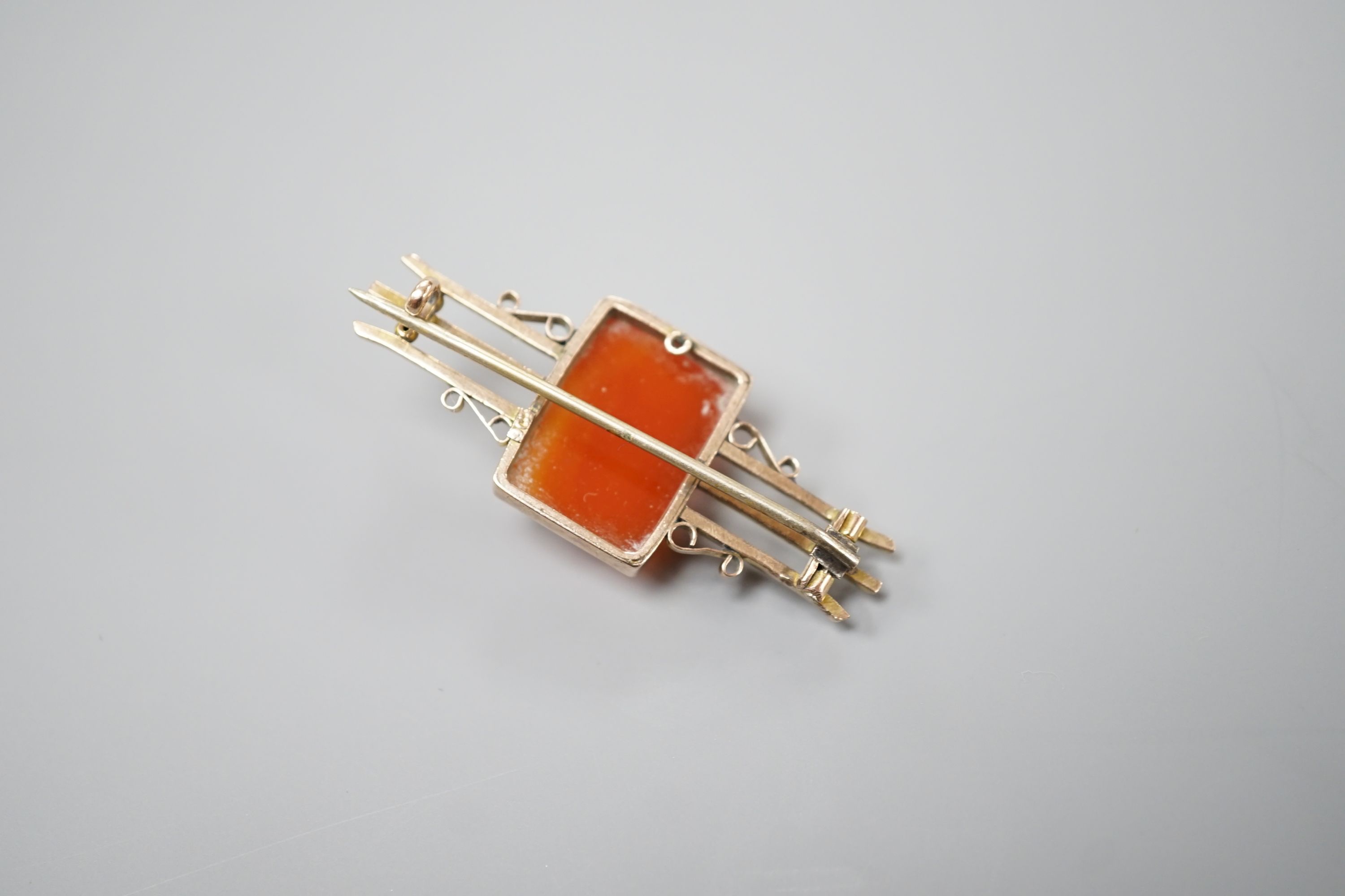 An early 20th century 9cy and sardonyx square cameo set bar brooch, carved with the bust of a lady to dexter, 45mm, gross weight 7.6 grams.